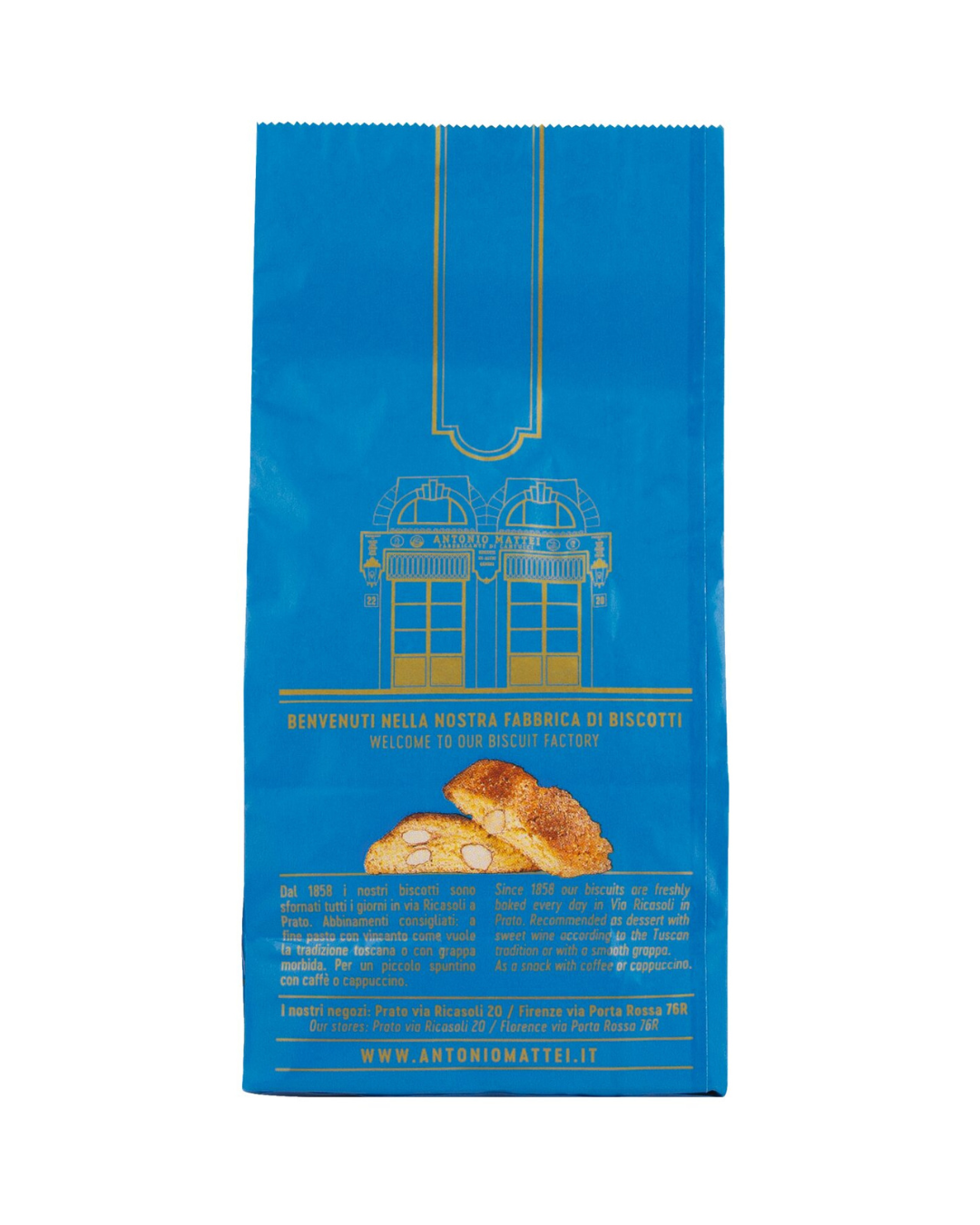 Eine blaue Papiertüte mit goldenen Illustrationen und einem Biscotti-Motiv unten, auf der auf Italienisch und Englisch „Willkommen in unserer Keksfabrik“ steht, hebt die Marke Viani | „Cantuccini La Mattonella“ – toskanische Mandelkekse 125 g – sowie das Viani-Branding hervor.