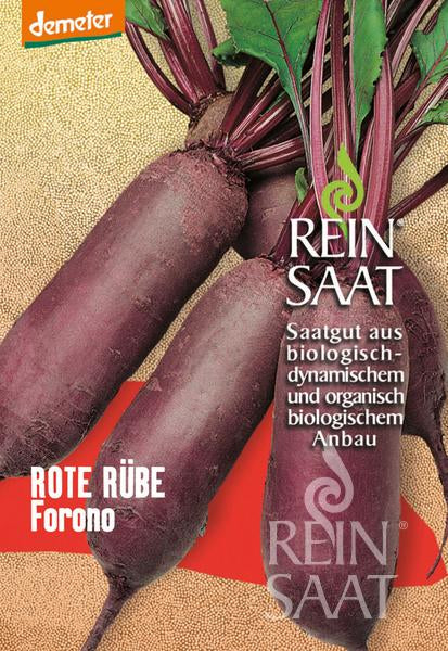 Abgebildet sind drei längliche, dunkelrote Reinsaat | Rote Rübe 'Forno' Rüben mit belaubten Stielen. Die Reinsaat-Verpackung ist aus biologischem, biodynamischem Anbau - ideal für Sommer- und Herbsternte und bekannt für ihre gute Lagerfähigkeit.