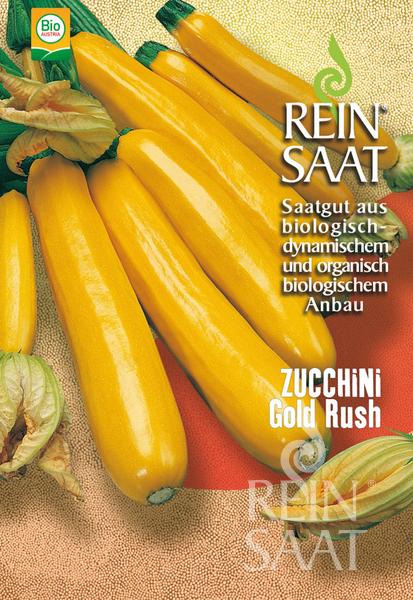 Reinsaat | Zucchini 'Gold Rush' von Reinsaat zeigt goldgelbe, buschige Zucchinis mit Blüten und Blättern auf gelbem Grund. Die Sorte wird hervorgehoben, zusammen mit deutschen Informationen über den biologischen und ökologischen Anbau.