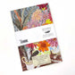 Das Angie Lewin | Notizbuch 'Zebra,Dahlien und Federn' von Art Angels hat ein lebendiges, geblümtes Cover und wird mit einer weißen ART ANGELS-Banderole, Barcode und dem Vermerk "Printed in England" geliefert.