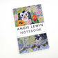 Das Angie Lewin Notizbuch 'Wally Dogs and Tulpen' von Art Angels zeigt florale Kunstwerke, Tulpen und Wally Dogs auf dem Einband. Größe: 135 x 210 mm, mit 48 unbedruckten Seiten.