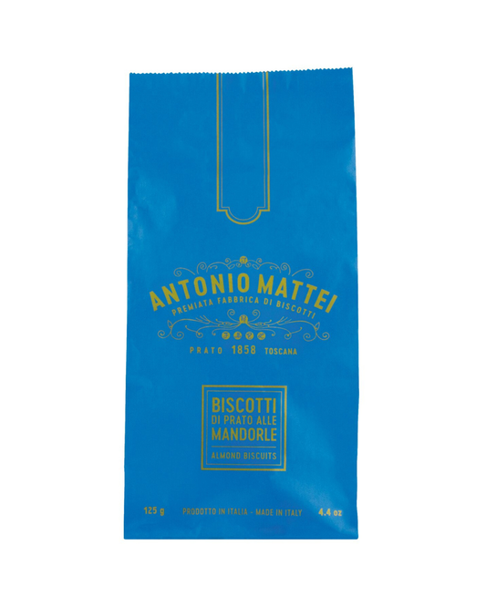Eine blaue Tüte mit „Cantuccini La Mattonella“ von Viani, toskanischen Mandelkeksen, wiegt 125 g (4,4 oz) und ist mit goldfarbener Schrift verziert.