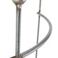 Eine Nahaufnahme der Hirsch 2x Staudenhalter HUGO halbrund, Metall-Pflanzenständer mit kugelförmigen Endstücken und geschwungenem Design, vor weißem Hintergrund.