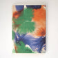 Papaya Paper Products | Notizheft A6 mit Aquarell-Motiv: Dieses Notizheft zeigt ein abstraktes Aquarell-Design in Grün, Blau, Orange und Lila mit "Papier"-Print. Es enthält blanko Seiten und liegt vor weißem Hintergrund.