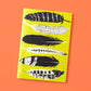 Papaya Paper Products | Schönes Notizheft A5 mit Federn in gelb: Dieses Notizheft besticht durch sechs schwarz-weiße Federillustrationen auf gelbem Cover, orange hinterlegt. Aus FSC-zertifiziertem Munken Print Cream Papier für ein hochwertiges Schreibgefühl.