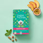 Eine Schachtel English Tea Shop | Tropische Minze, BIO, 20 Teebeutel von Royal Nature GmbH & Co. KG - English Tea Shop Germany ist umgeben von frischer Minze, ganzer Muskatnuss, weißem Tee, Pfirsichspalten und halbierten Passionsfrüchten auf hellgrünem Hintergrund.
