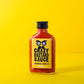 Eine 100-ml-Flasche Crazy Bastard Sauce Habanero & Tomatillo scharfe Soße, mit gelbem Etikett, fettgedruckter schwarzer Schrift und illustrierten Augen auf gelbem Hintergrund - ideal für Fans von scharfen Soßen.