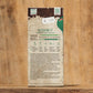 Eine rechteckige Sperli's-Schachtel mit der Aufschrift Hochbeet Bodenkur 'Bodenfit' 200 g enthält deutsche Pflanzinformationen, einen 3,99 €-Aufkleber, Aussaatsymbole und ein erdiges Gründüngermischung-Design auf einem natürlichen Holzhintergrund.