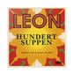 Heller Einband mit plakativem "LEON | Hundert Suppen" von Rebecca Seal & John Vincent mit orange-gelbem Blumendesign - genießen Sie schnelle und kreative Suppenrezepte im LEON Suppenbuch vom Dumont Verlag.