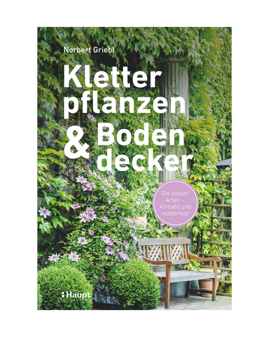 Das Buchcover zeigt eine üppige Gartenmauer mit Kletterpflanzen und Bodendeckern sowie einen Holztisch mit Bank. Titel: "Kletterpflanzen und Bodendecker | Klimastark und wetterfest" von Thorbecke Verlag.