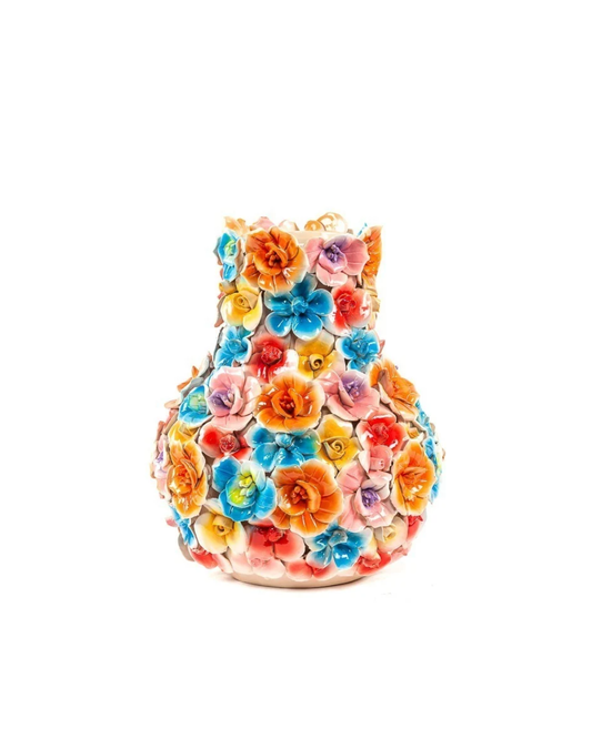 Die Vase „Des Pots | Vase mit bunten Deko-Blumen, H 29, Ø 9,5–26 cm“ von Des Pots ist aus Keramik handgefertigt und mit farbenfrohen, dreidimensionalen Blüten in Blau, Gelb, Orange, Rosa und Rot auf weißem Hintergrund verziert.