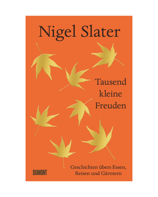 Orangefarbener Bucheinband mit goldenen Herbstblättern. Titel: "Tausend kleine Freuden | von der Küche über den Garten bis zu fernen Reisen." Von Food-Journalist Nigel Slater. Verlag: Dumont Verlag.