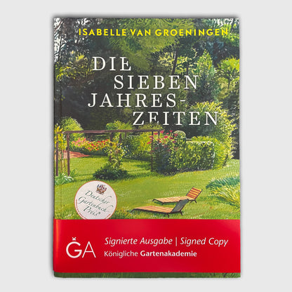 Das Cover von Die Sieben Jahreszeiten von Isabelle Van Groeningen zeigt einen lebendigen Garten, der ihren Garten- und Bepflanzungsstil widerspiegelt. Ein roter Streifen weist es als signiertes Exemplar der Königlichen Gartenakademie aus.
