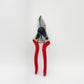Die Felco 6 Gartenschere (Größe M, 20 mm/0,8 Zoll) von Felco verfügt über rote Griffe und eine silberne Klinge und bietet optimale Schneidkraft und ergonomischen Komfort. Sie ist aufrecht vor einem schlichten weißen Hintergrund abgebildet.
