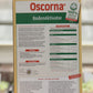 Auf einer Holzfläche ist eine 3 kg-Packung Oscorna | Boden Aktivator abgebildet, ein Bodenaktivator, der das Bodenleben und das gesunde Pflanzenwachstum fördert. Die deutsche Verpackung zeigt Anwendungshinweise, Vorteile und Anwendungstabellen.