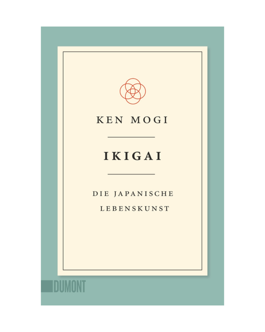 Buchumschlag von Ikigai | Die japanische Lebenskunst aus dem Dumont Verlag, mit einem minimalistischen Design in Creme und Teal und einem kleinen roten geometrischen Blumensymbol, das die japanische Philosophie für ein erfülltes Leben widerspiegelt.