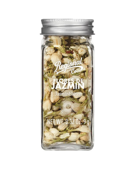 Ein klares Glas mit einem silbernen Deckel enthält Viani | Jasminblüten 9 g, perfekt für Jasmintee oder Blumenaufgüsse. Das Etikett zeigt die Marke Viani und NET WT 0.32 OZ / 9g.