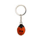 Der Wildlife Garden Schlüsselanhänger 'Marienkäfer' ist ein handgefertigter Holz-Anhänger mit Metallring und Kette, gestaltet als roter Marienkäfer mit schwarzen Punkten.