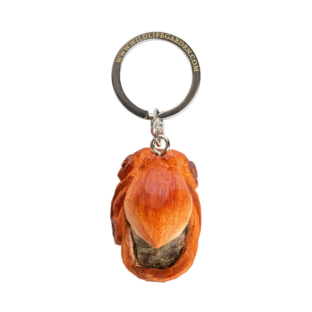 Ein maritimes Geschenk: Der Wildlife Garden Schlüsselanhänger aus handgefertigtem Holz zeigt einen detailreichen Oktopus und ist an einem Metallring mit www.wildlifegarden.com befestigt.