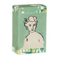 Eine rechteckige 150g Archivist | 'Aloe Vera' Handseifenschachtel von Archivist Gallery, mit einem grün, weiß und gelb marmorierten Design, einer Strichzeichnung einer kurzhaarigen Person und "Savon d'Archivist divine soap" in goldener Schrift.
