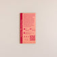 Eine Piccolo Seeds | Tomaten-Thai-rosa Ei rosa Saatgutpackung von Piccolo Seeds mit Sortenangaben, QR-Codes, Anleitungen und Icons ist auf einem schlichten hellen Hintergrund fotografiert, der diese südostasiatische Tomatenspezialität hervorhebt.