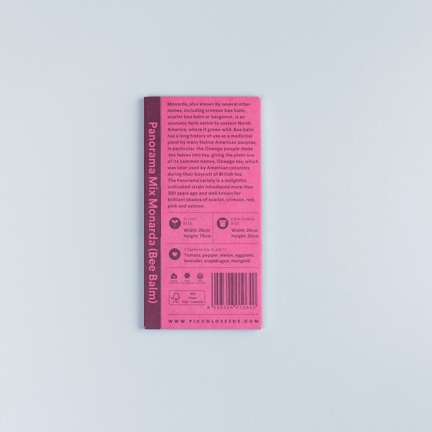 Eine rosafarbene Piccolo Seeds-Packung mit der Aufschrift 'Monarda Panorama-Mix' scharlachroter Bienenbalsam/Bergamotte mit Pflanzeninfos, Pflegetipps und Symbolen, dargestellt auf hellgrauem Hintergrund.