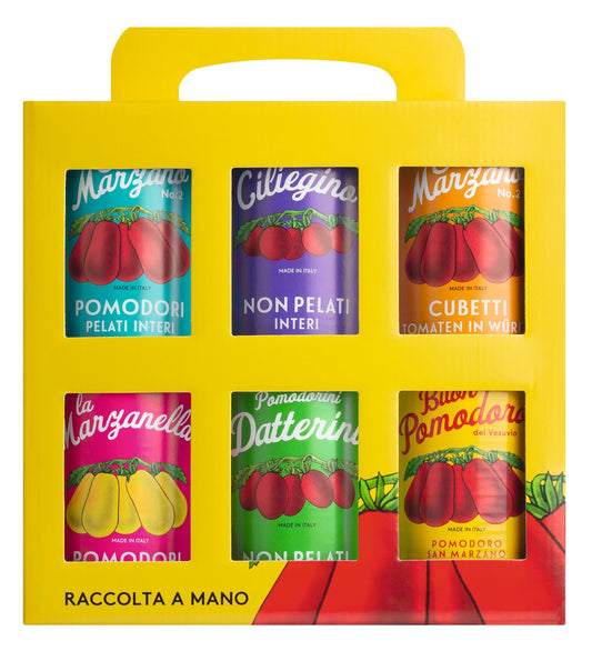 Eine gelbe Schachtel mit Henkel präsentiert Viani | Tomatendosen 6 x 400 g, sechs farbenfrohe Dosen mit alten San Marzano-Tomatenetiketten. Auf der Dose ist "Raccolta a Mano" aufgedruckt - ein authentisches Viani Vintage-Tomatenset.