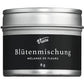 Eine silberne Dose mit schwarzem Etikett trägt die Marke Viani und den Namen 'Mélange de fleurs' Blütenmischung, die essbare Blüten für die kreative Küche hervorhebt, mit 8g darunter.