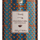 Eine 250-g-Dose „Venchi | Kakaopulver für heiße Schokolade“ mit einem geometrischen Design in Blau, Orange und Braun und einem goldenen Deckel. Auf dem Etikett sind der Markenname „Venchi“ sowie Produktinformationen auf Italienisch und Englisch zu sehen – ideal für Liebhaber italienischer Schokolade, die ein authentisches Geschmackserlebnis suchen.
