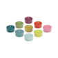 Das Remember Teelicht Set 'Sydney' enthält 9 bunte Kerzen aus veganem Stearin in Teal, Grün, Lila, Orange, Gelb, Pink, Blau und Aqua - nachhaltig und stilvoll arrangiert auf weißem Hintergrund.