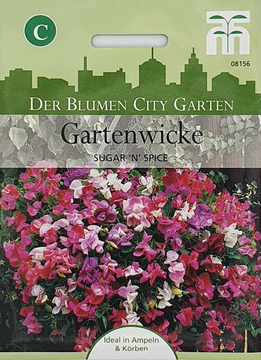 Eine Saatgutpackung von Thompson und Morgan mit der Aufschrift Gartenwicke Sugar 'n' Spice, die rosa, weiße und violette Blüten zeigt. Sie heben ihren süßen Duft hervor und weisen darauf hin, dass sie perfekt für Blumenampeln geeignet sind.