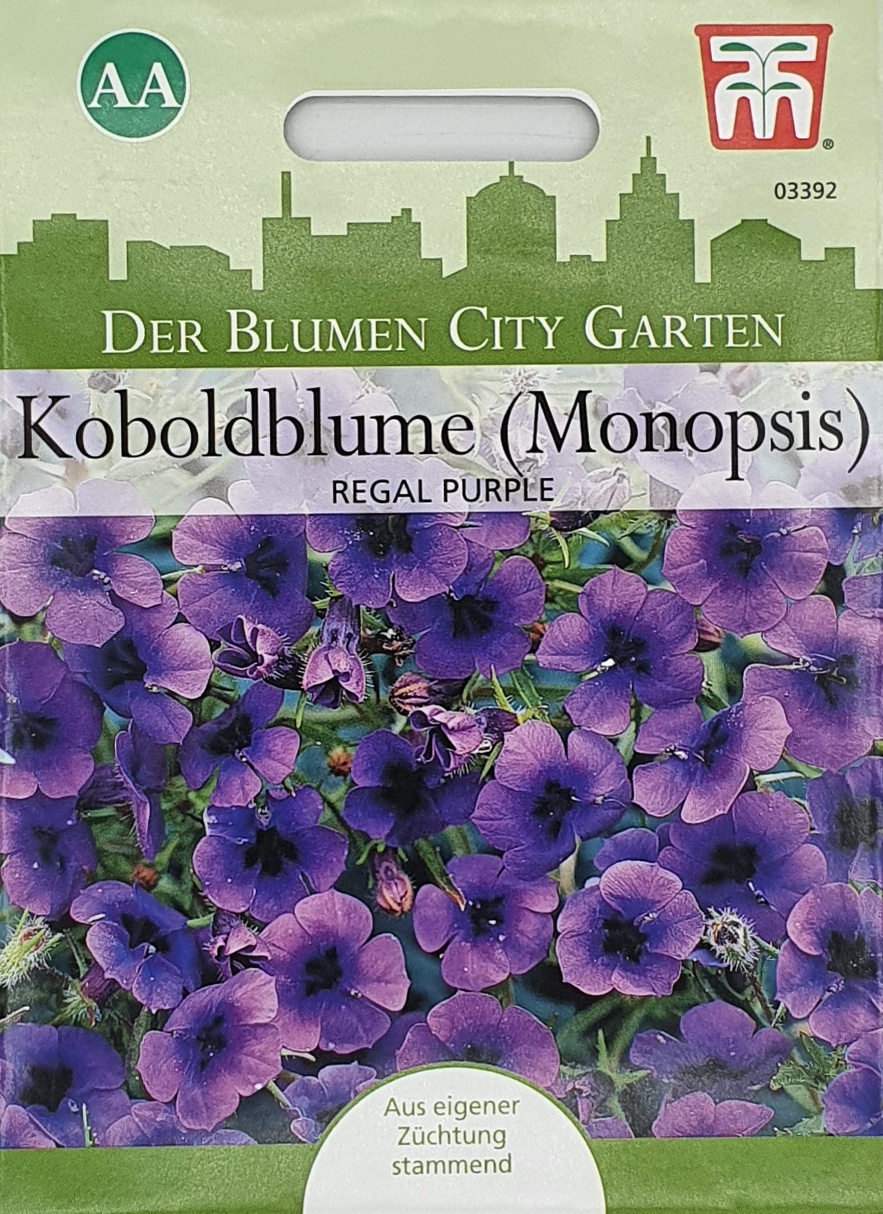 Eine Packung Thompson und Morgan Koboldblume (Monopsis) Regal Purple Samen zeigt mitternachtsblaue Blüten, deutschen Text, und eine Stadtsilhouette. Diese kompakte südafrikanische Pflanze ist ideal für Hängekörbe.